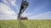 Picture of the ARTEC F40 EVO self-propelled sprayer at work in a rapeseed field