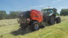 KUHN FB 3135 round baler making silage bales.